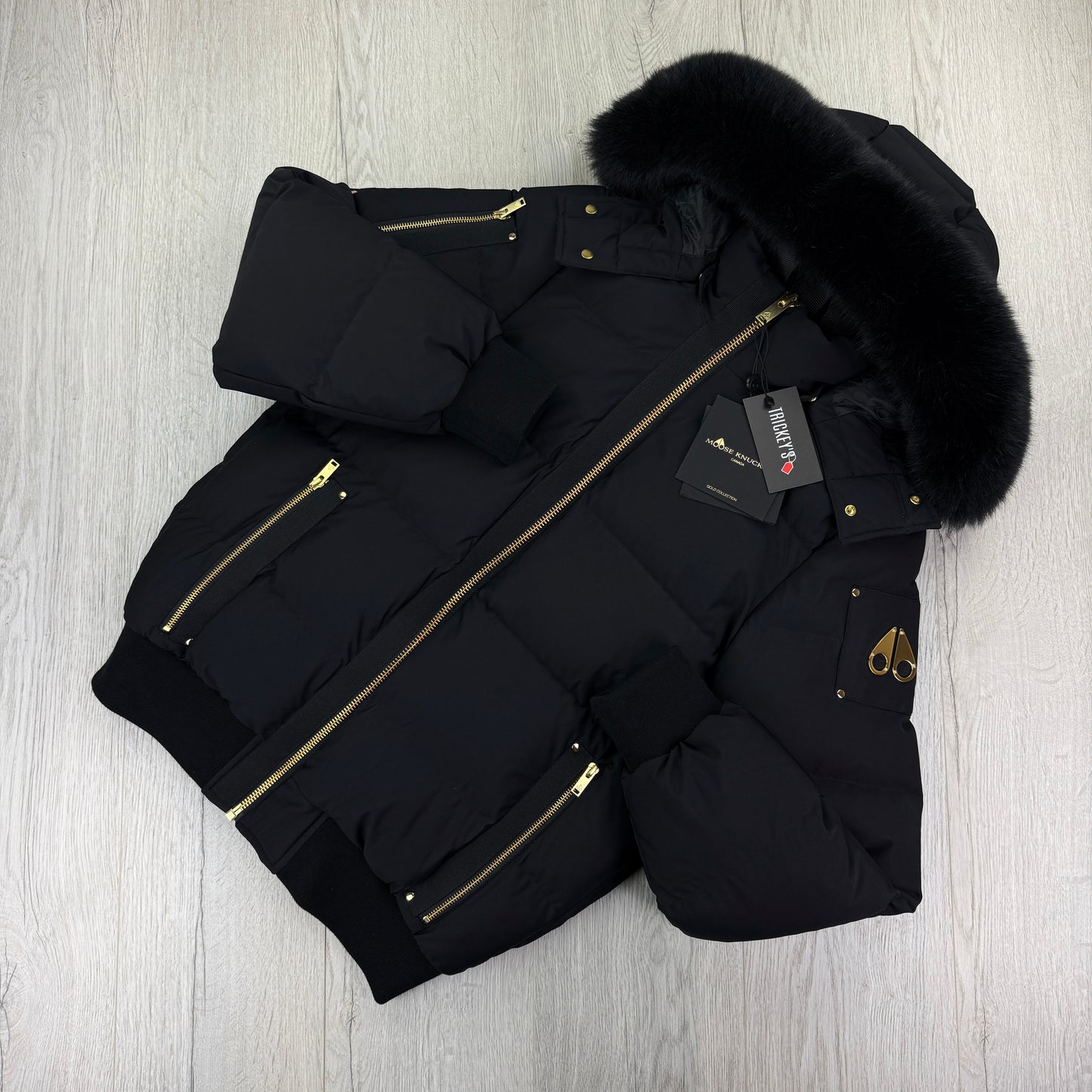 Moose Knuckles Men’s Black & Gold Double Zip Up Stagg Bomber Jacket