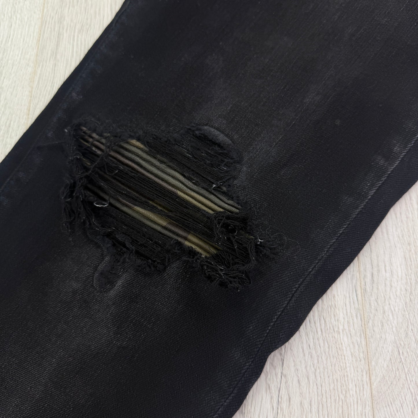 Amiri MX1 Men’s Black Distressed Core Camouflage Applique Jeans