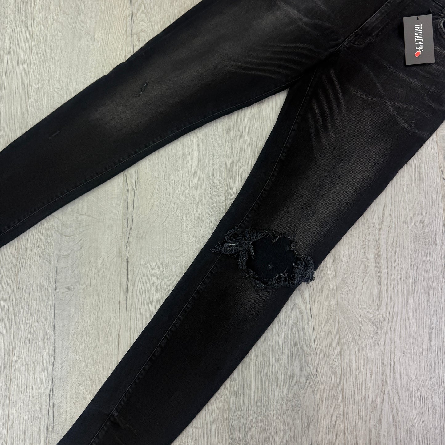 Amiri Men’s Black Ripped Jeans - Uk 33