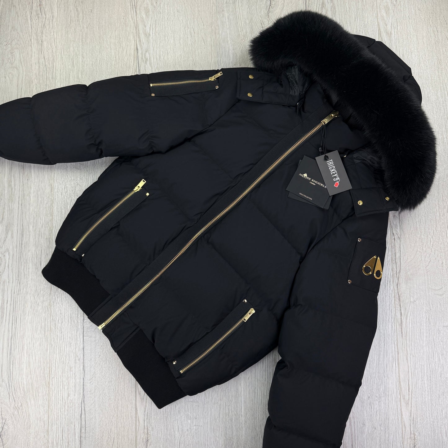 Moose Knuckles Men’s Black & Gold Double Zip Up Stagg Bomber Jacket