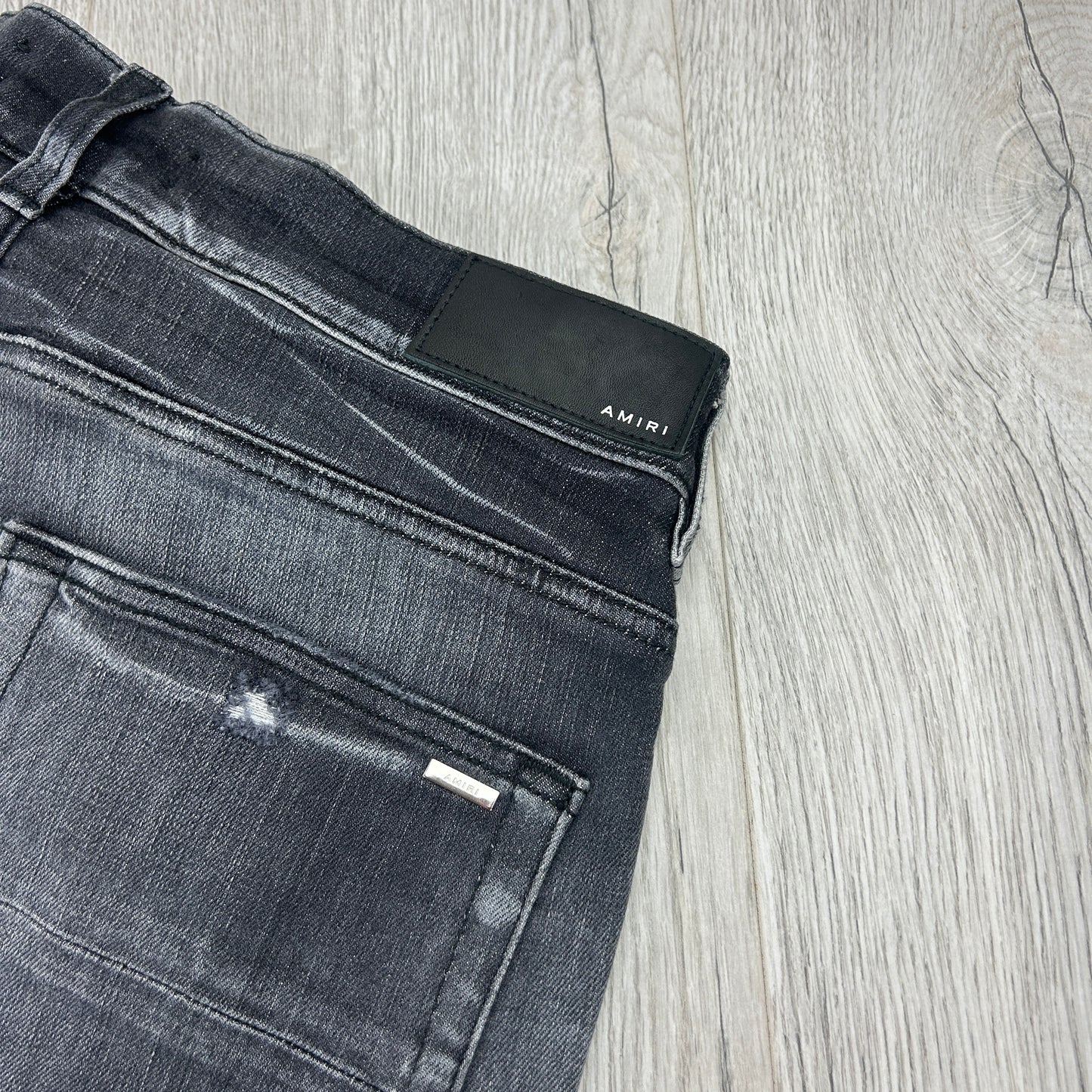 Amiri Men’s MX1 Black Distressed Jeans Blue Patch