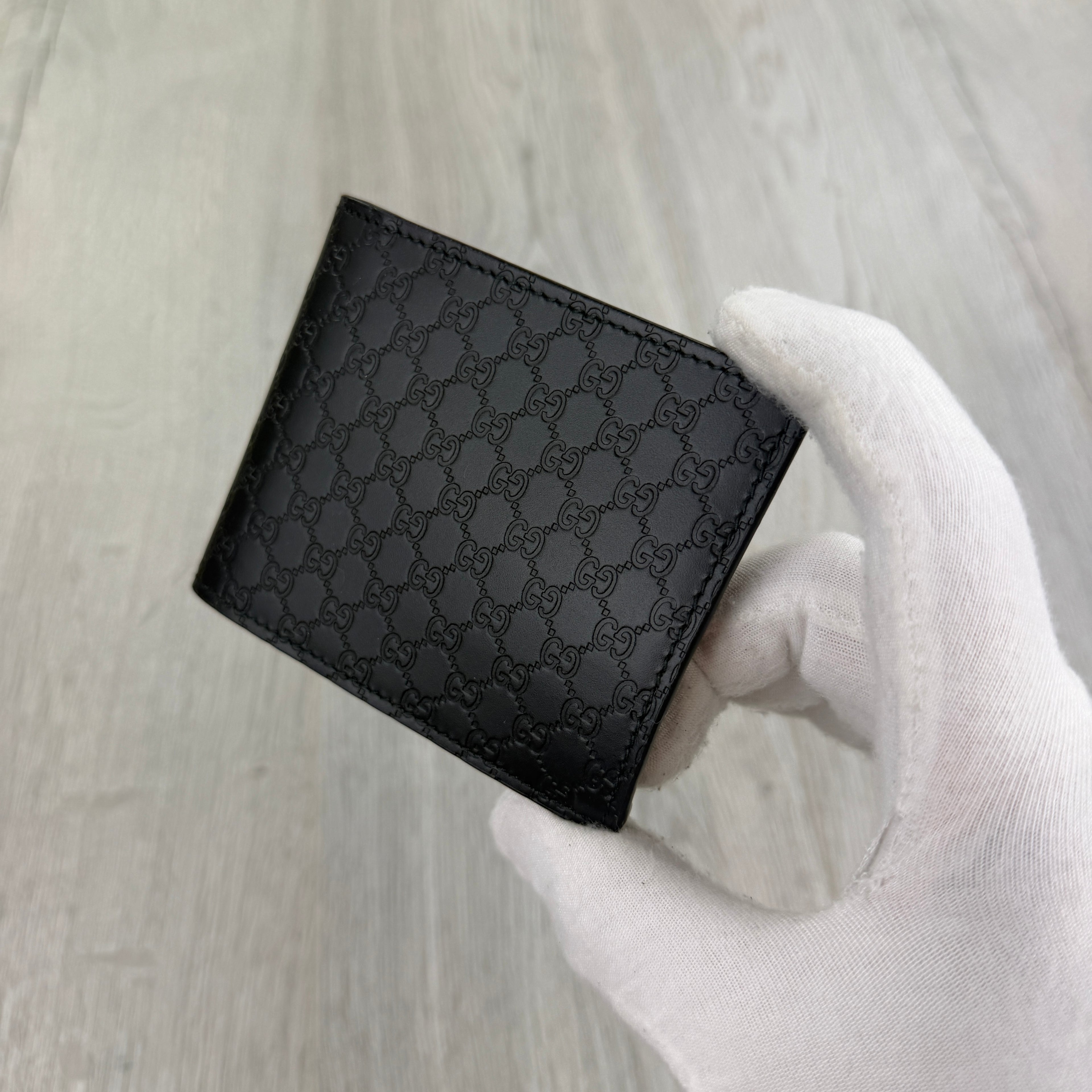 Gucci Men’s GG Leather Monogram Wallet