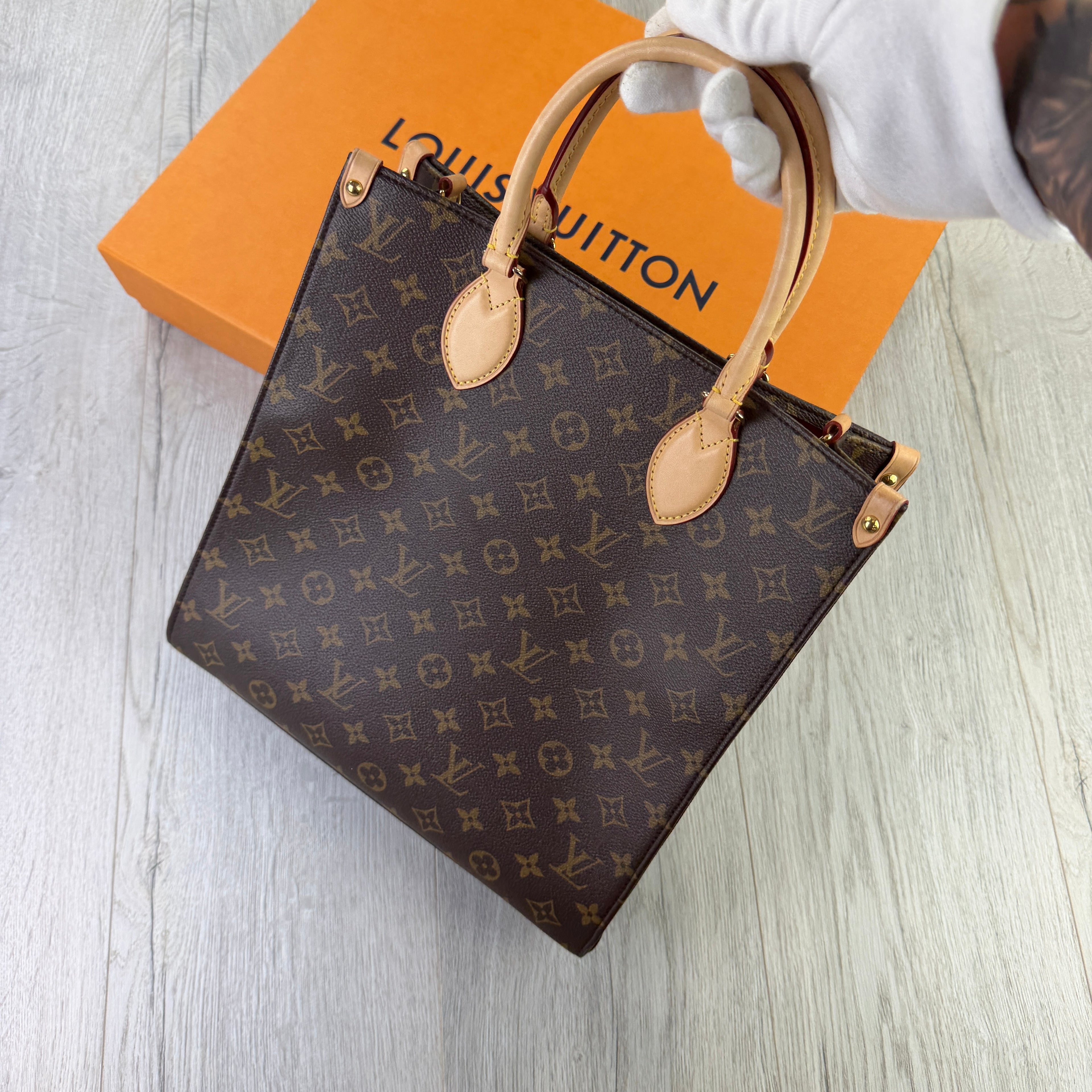 Louis Vuitton Women’s Brown Monogram Cloth Tote Bag