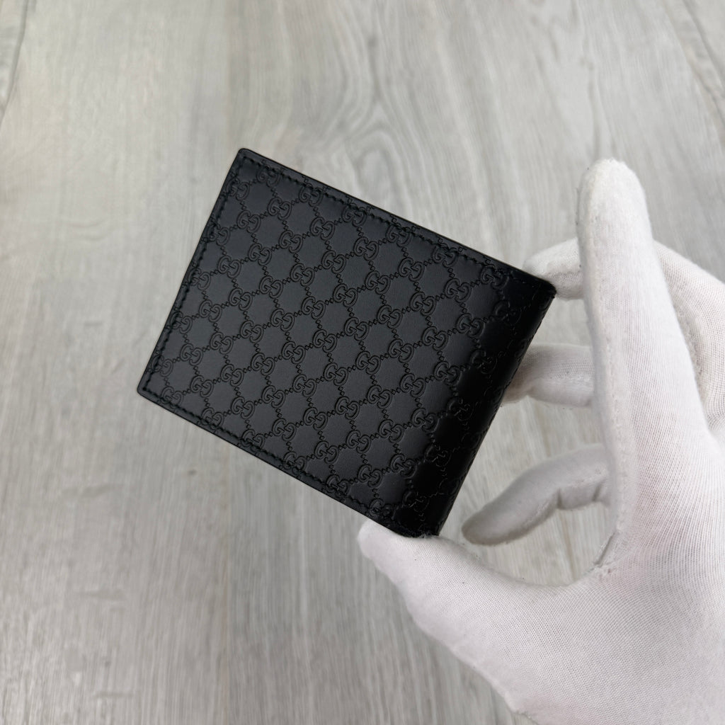 Gucci Men’s GG Leather Monogram Wallet