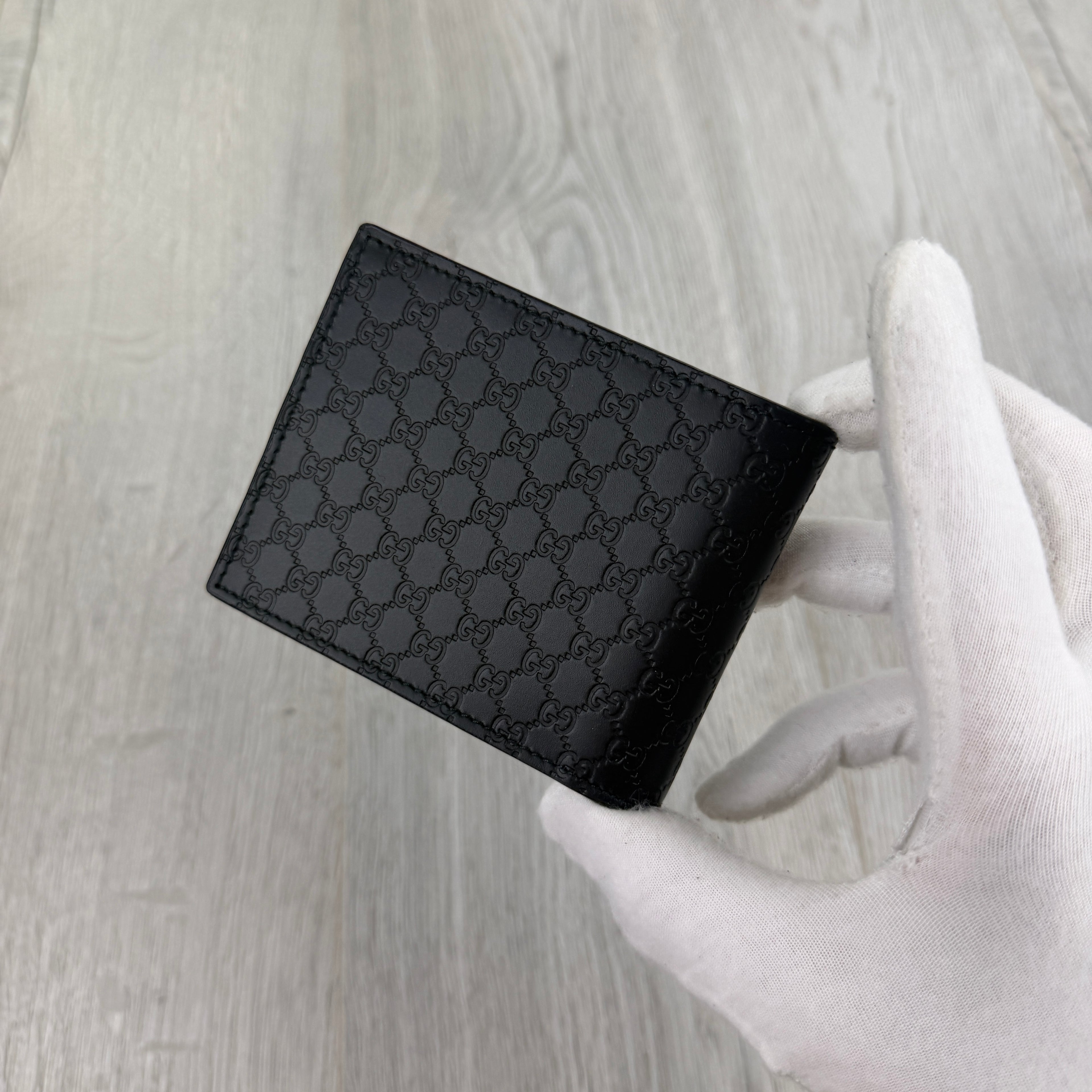 Gucci Men’s GG Leather Monogram Wallet