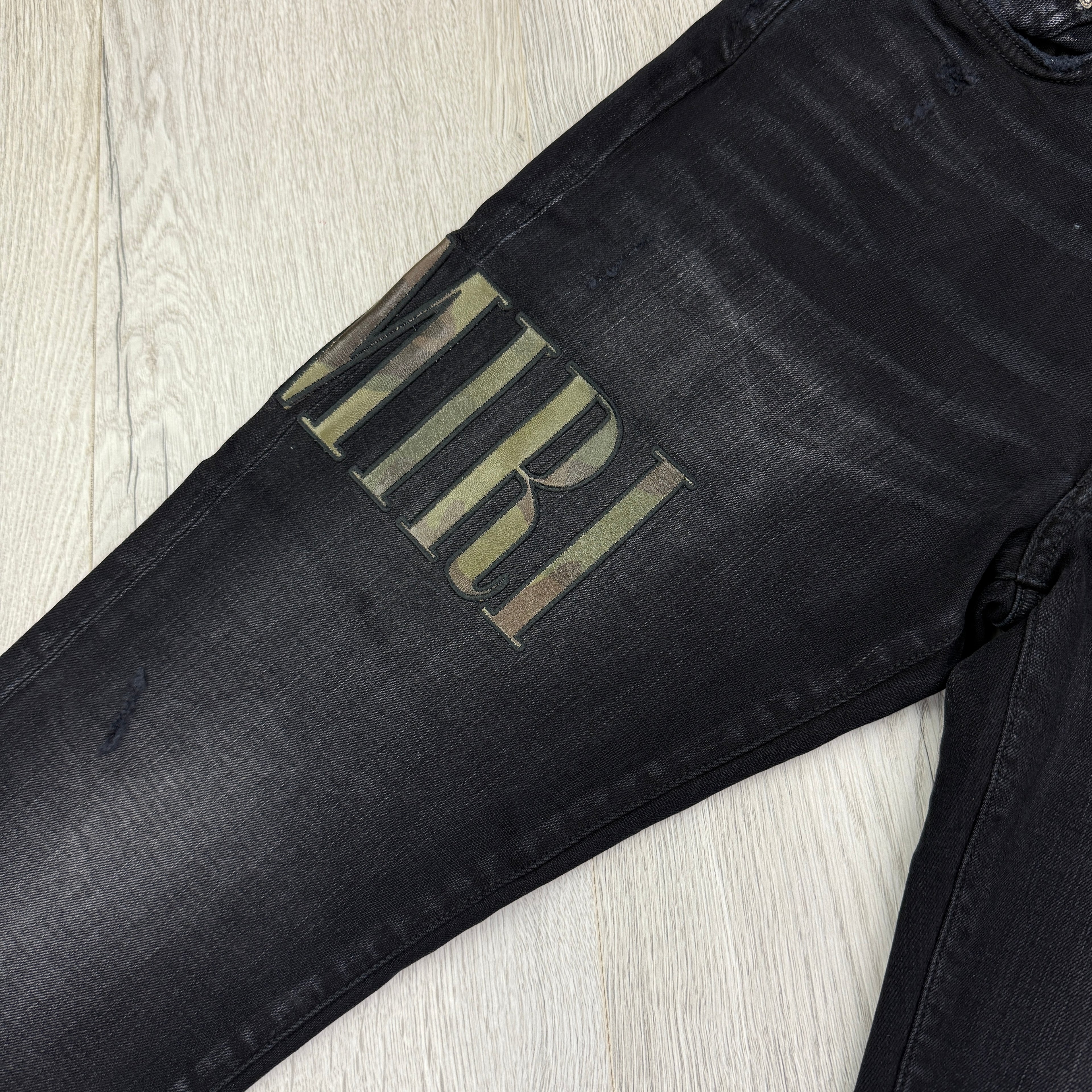 Amiri MX1 Men’s Black Distressed Core Camouflage Applique Jeans