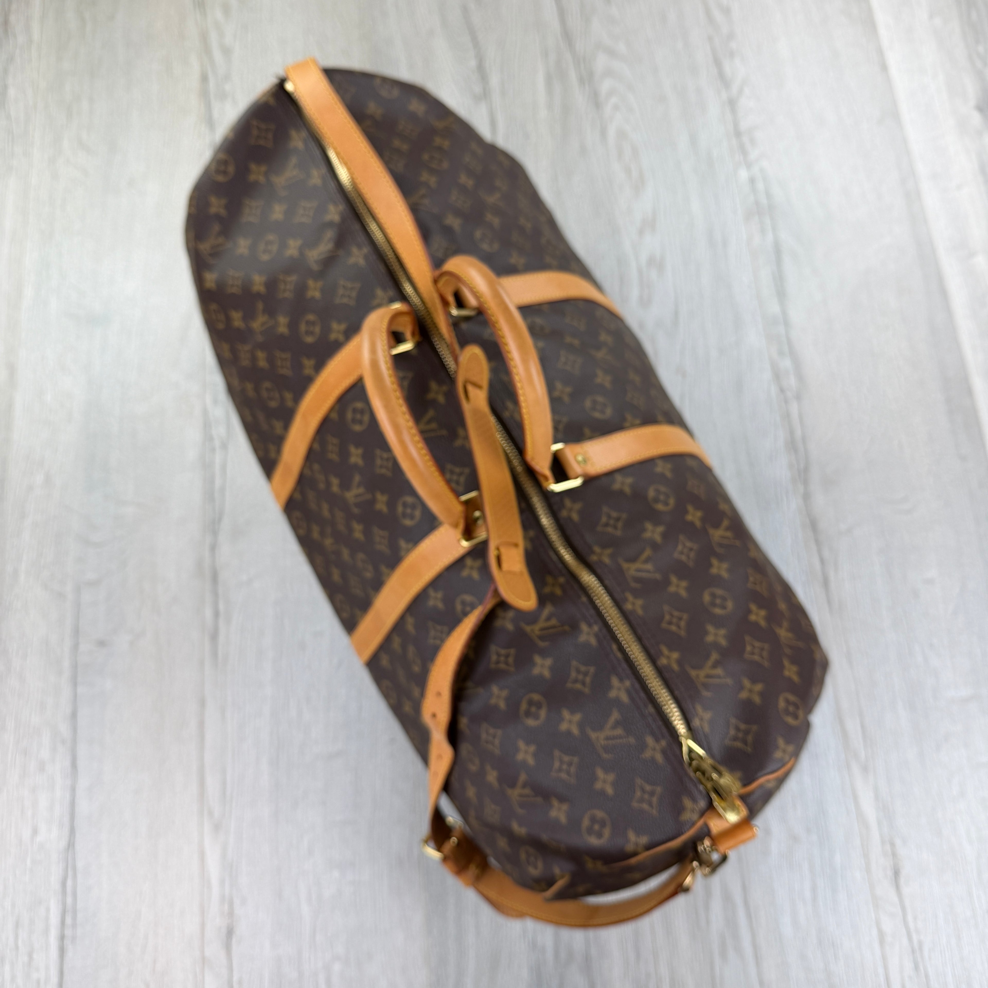 Louis Vuitton Men’s Brown Monogram Keepal Bag - 60