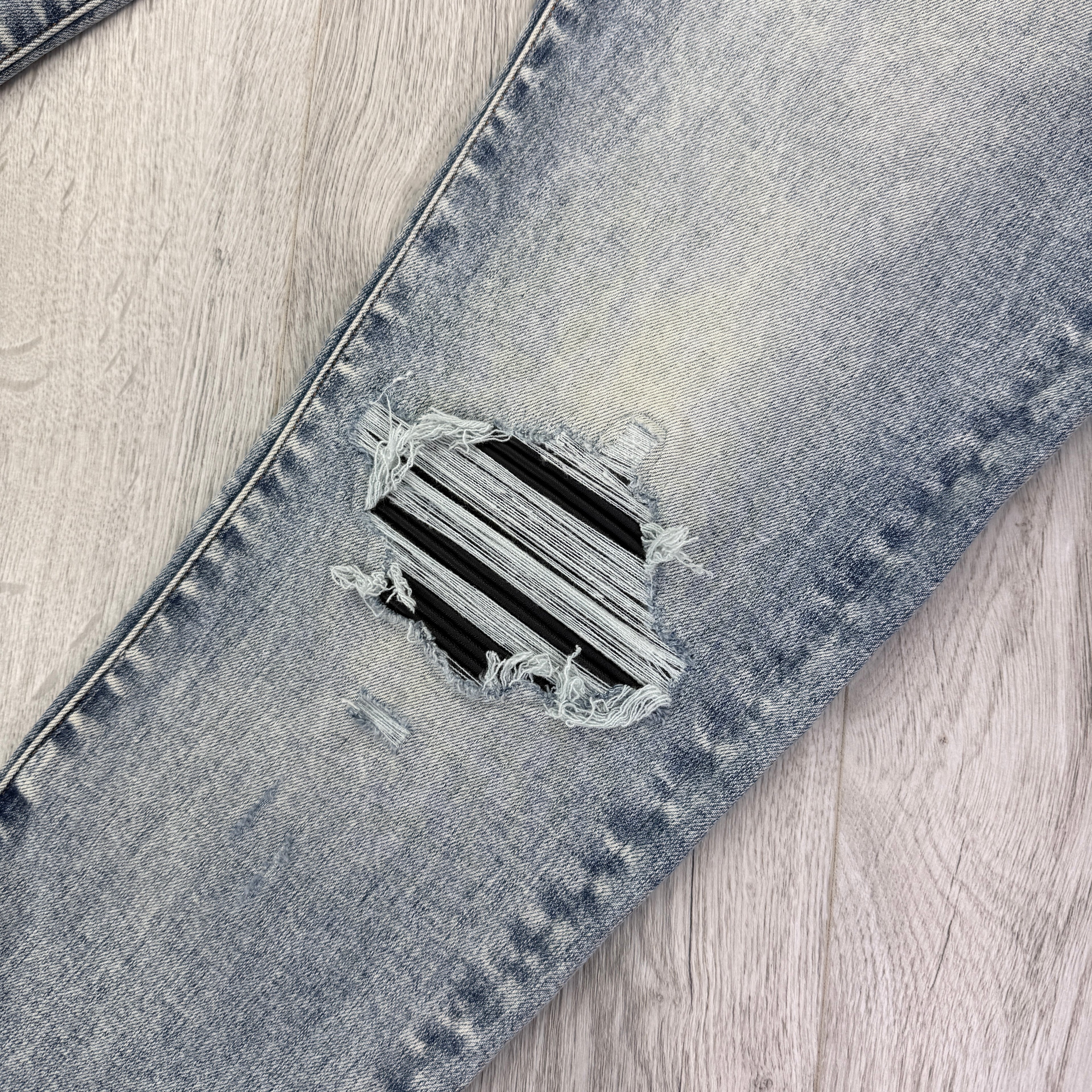 Amiri MX1 Men’s Blue Distressed Jeans