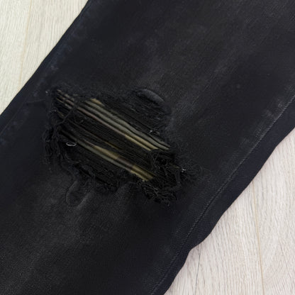 Amiri MX1 Men’s Black Distressed Core Camouflage Applique Jeans