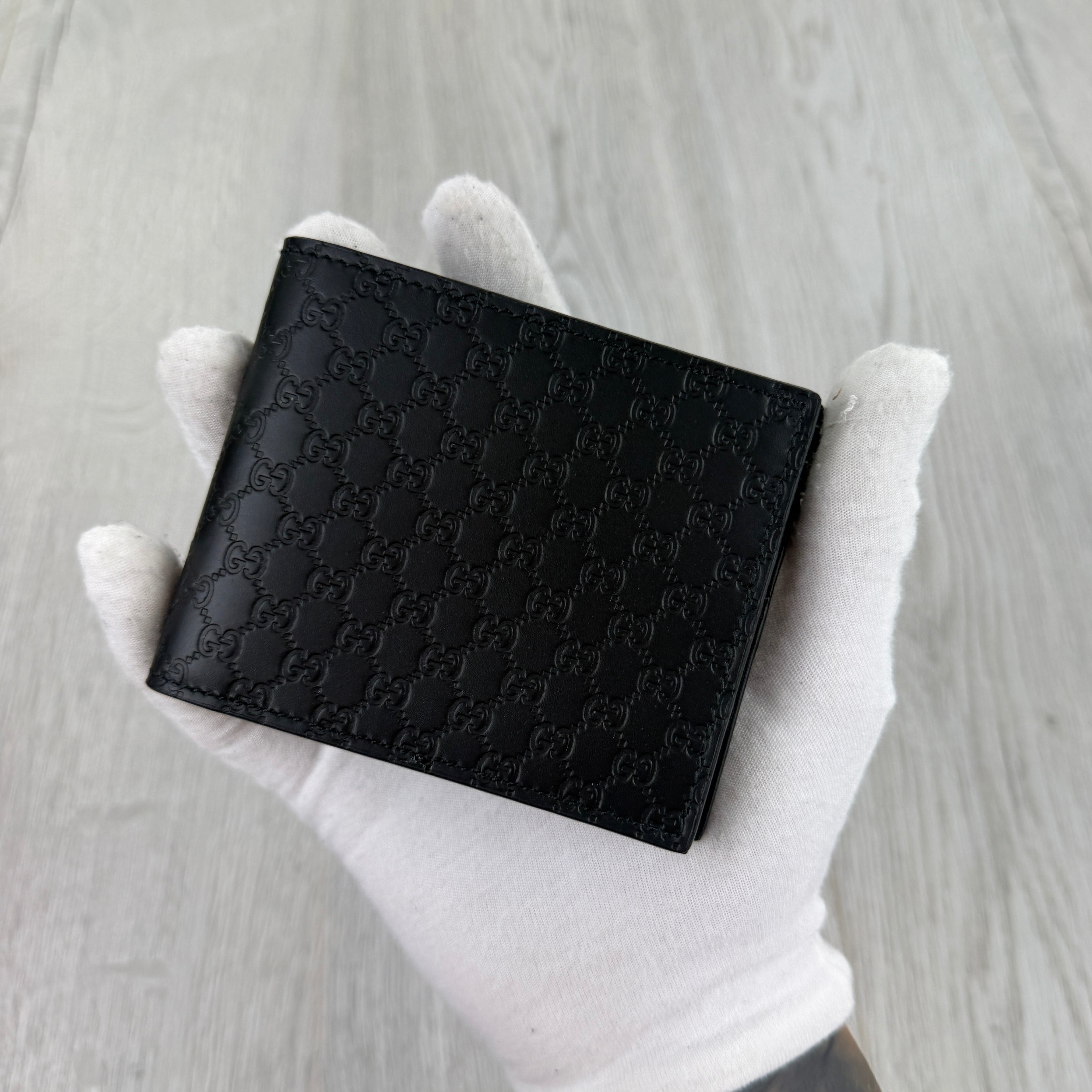 Gucci Men’s GG Leather Monogram Wallet