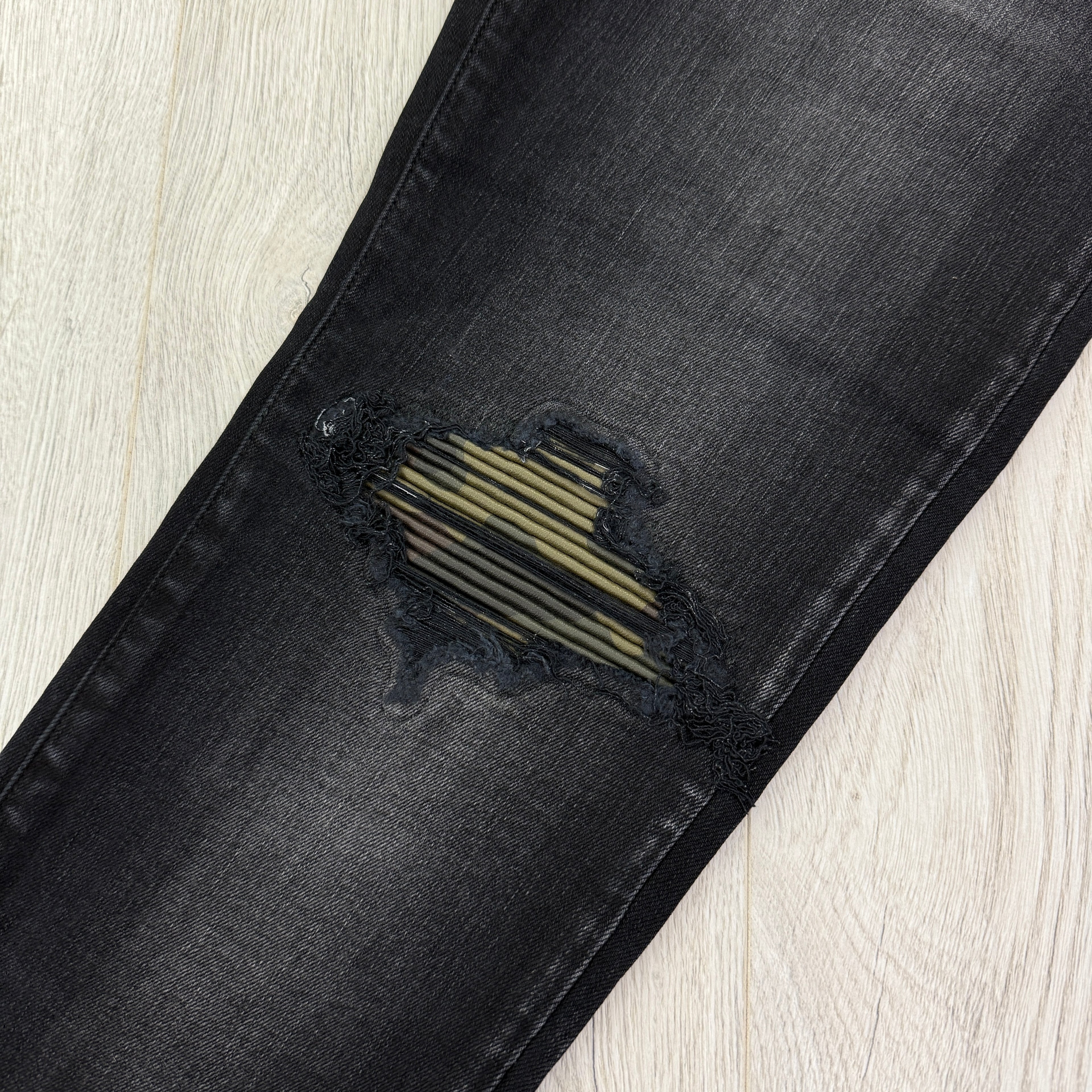 Amiri MX1 Men’s Black Distressed Core Camouflage Applique Jeans