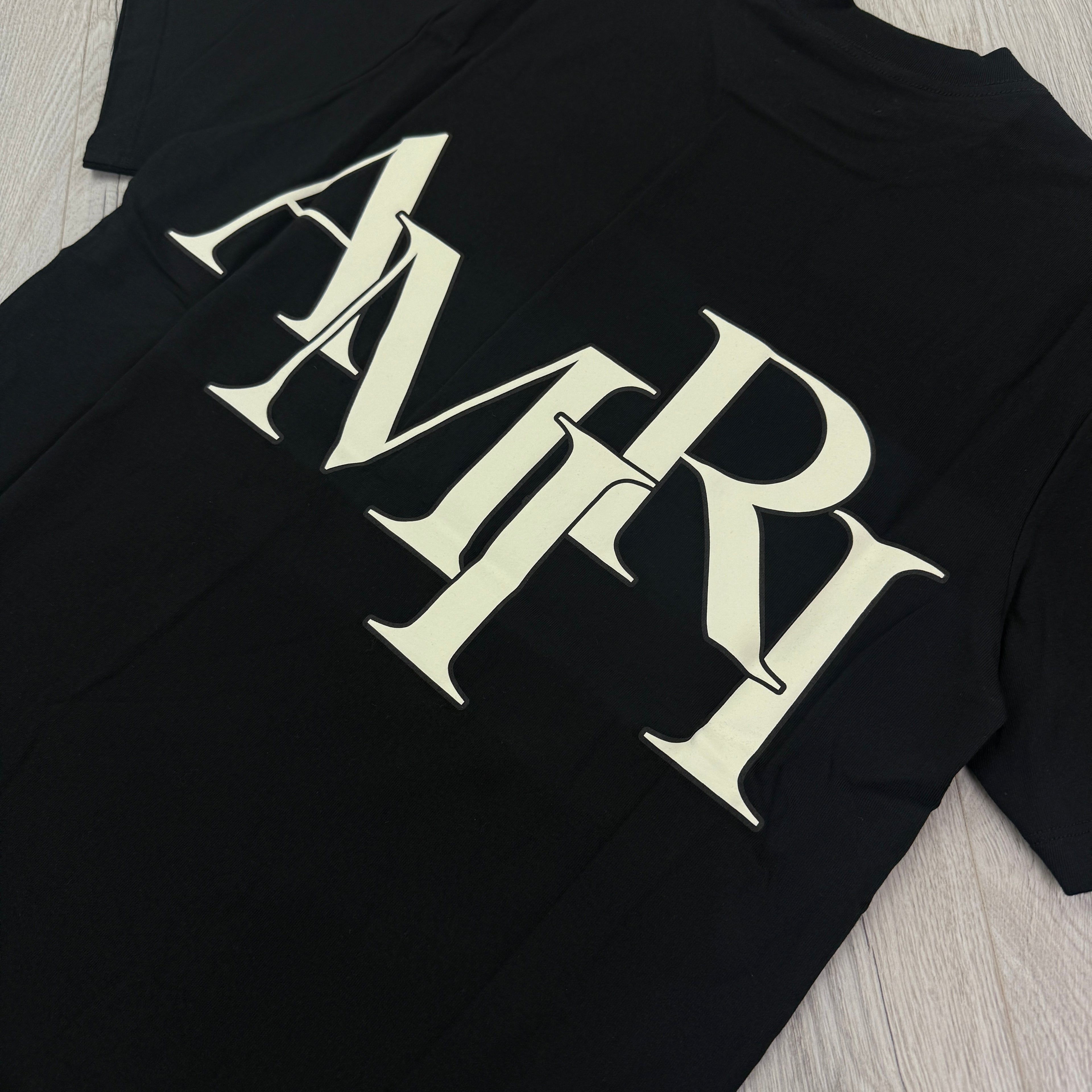 Amiri Men’s Black Staggered Logo T-shirt
