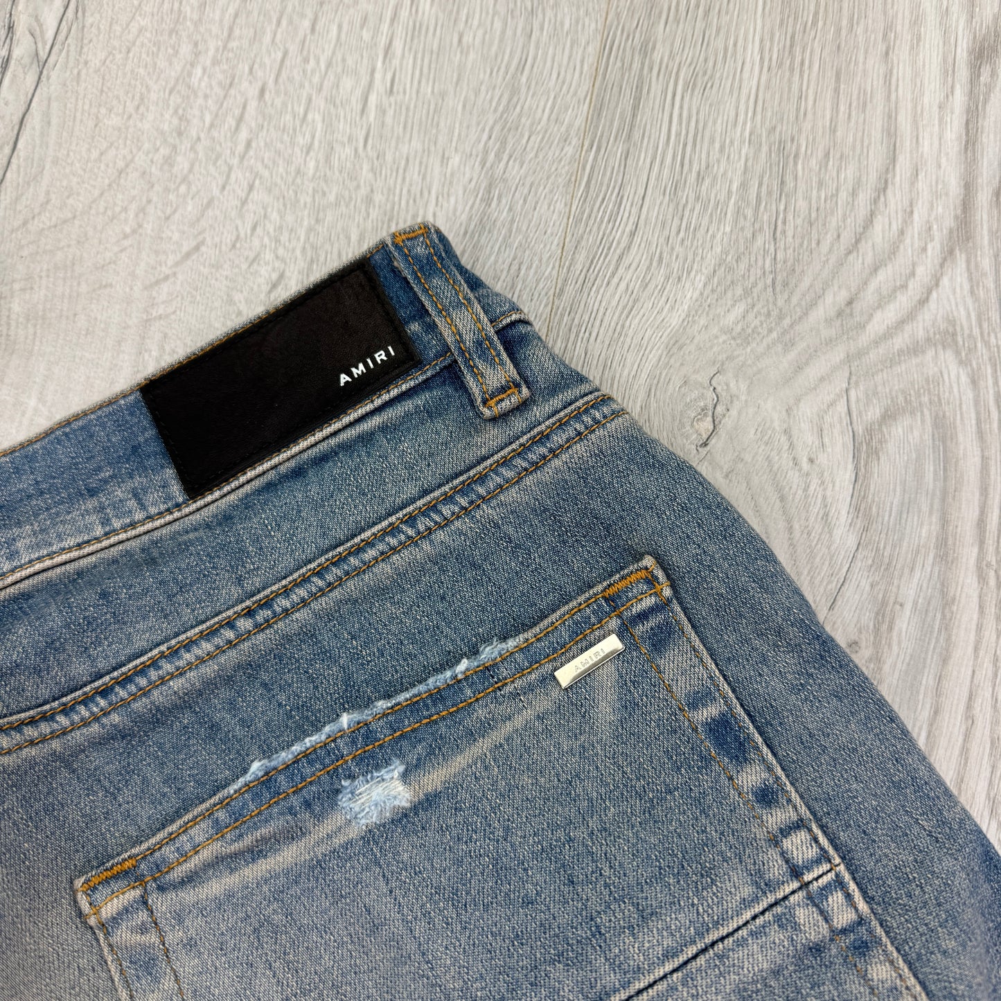 Amiri Men’s MX1 Distressed Camo Applique Logo Jeans