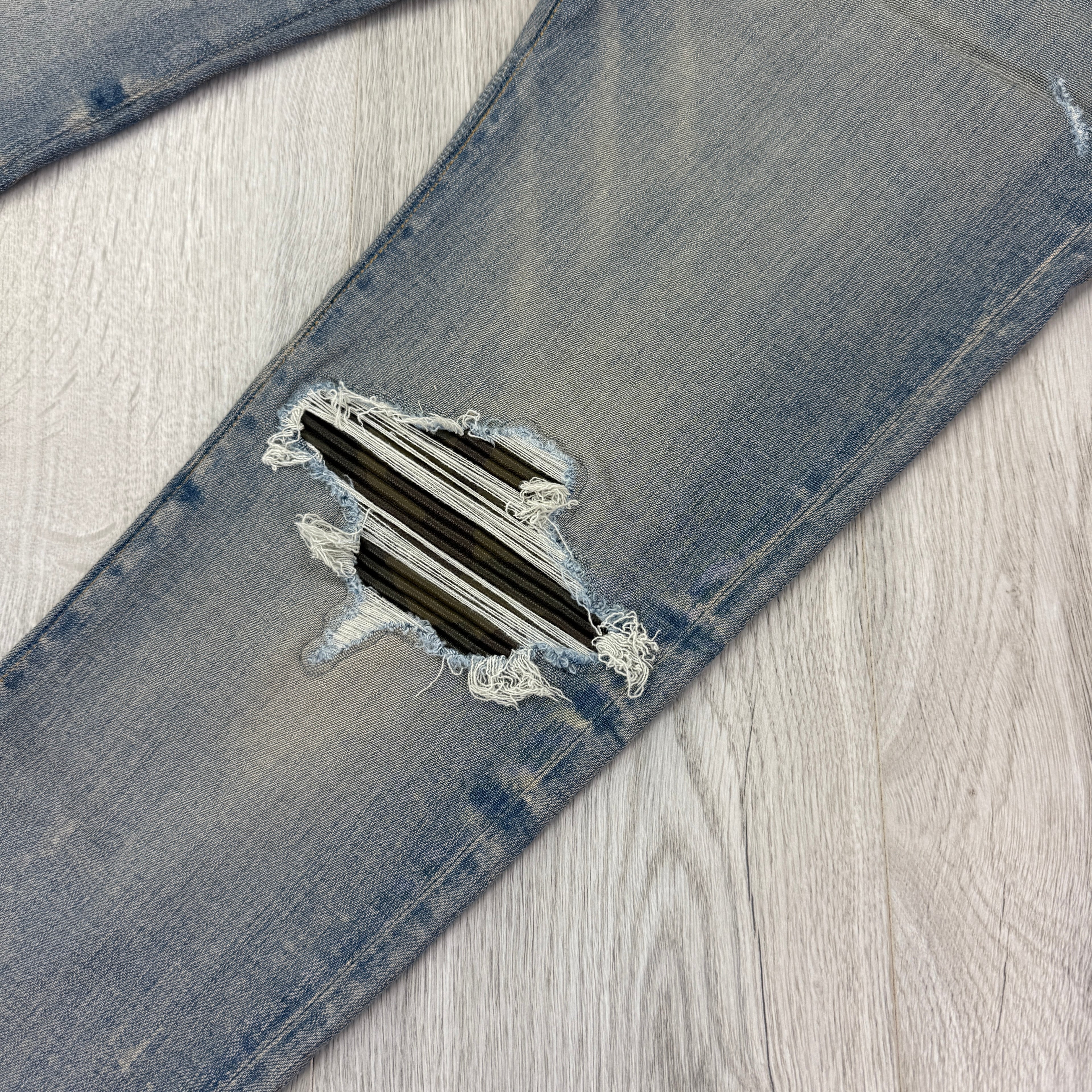 Amiri Men’s MX1 Distressed Camo Applique Logo Jeans