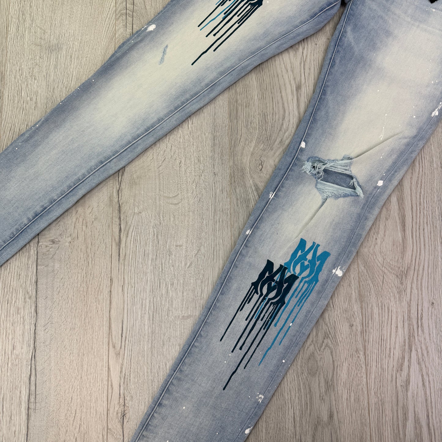 Amiri Men’s MX1 MA Logo Drip Blue Distressed Jeans