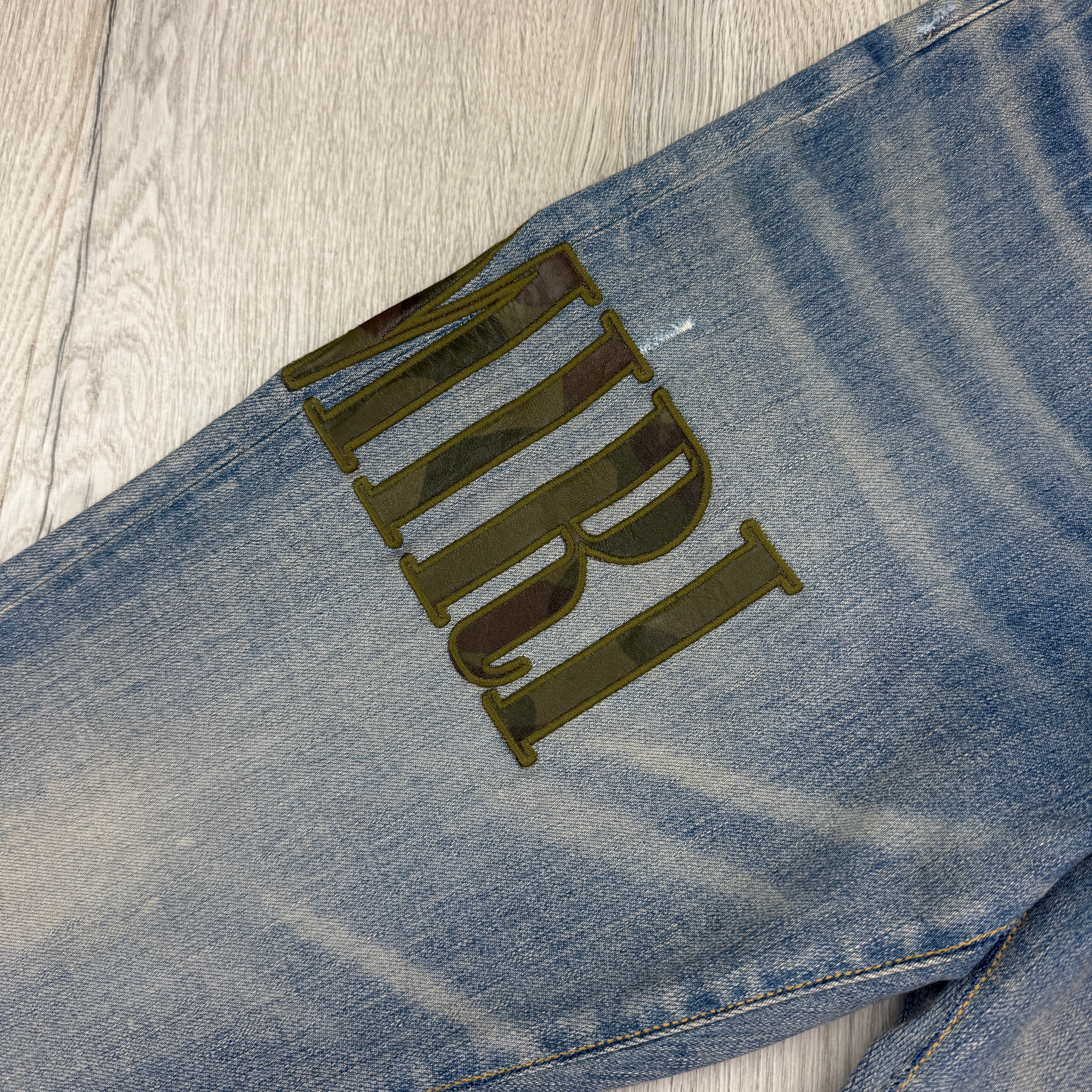 Amiri Men’s MX1 Distressed Camo Applique Logo Jeans