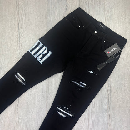 Amiri MX1 Men’s Black Distressed Jeans With Blue Side Logo