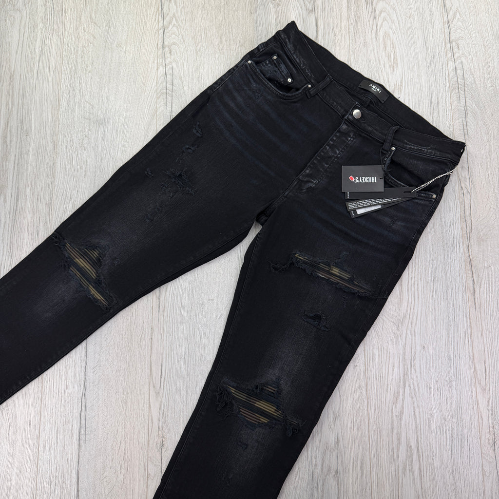 Amiri MX1 Men’s Black Distressed Core Camouflage Applique Jeans