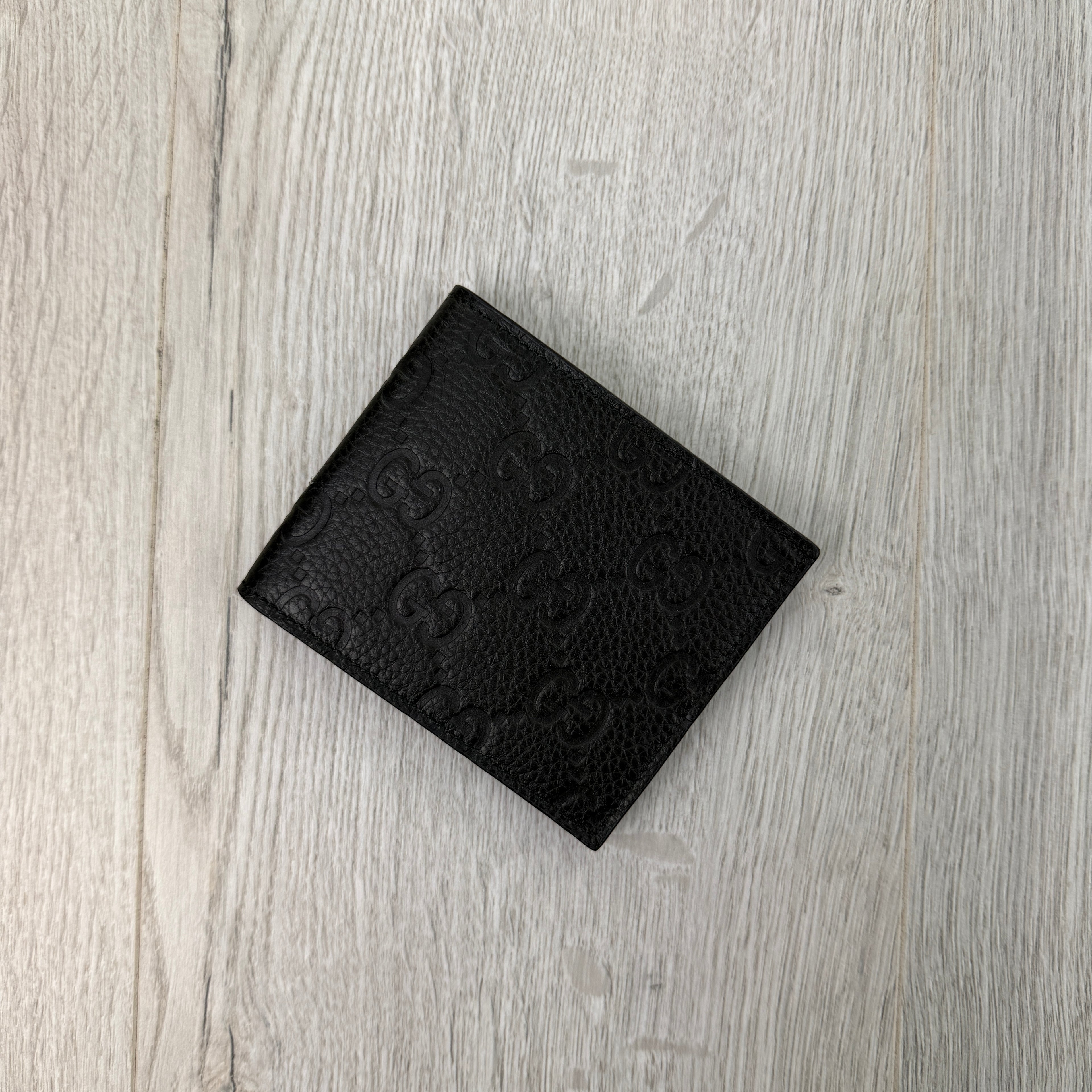 Gucci Men’s GG Leather Monogram Wallet