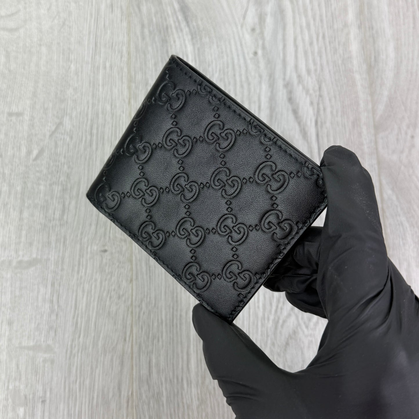 Gucci Men’s GG Leather Monogram Wallet