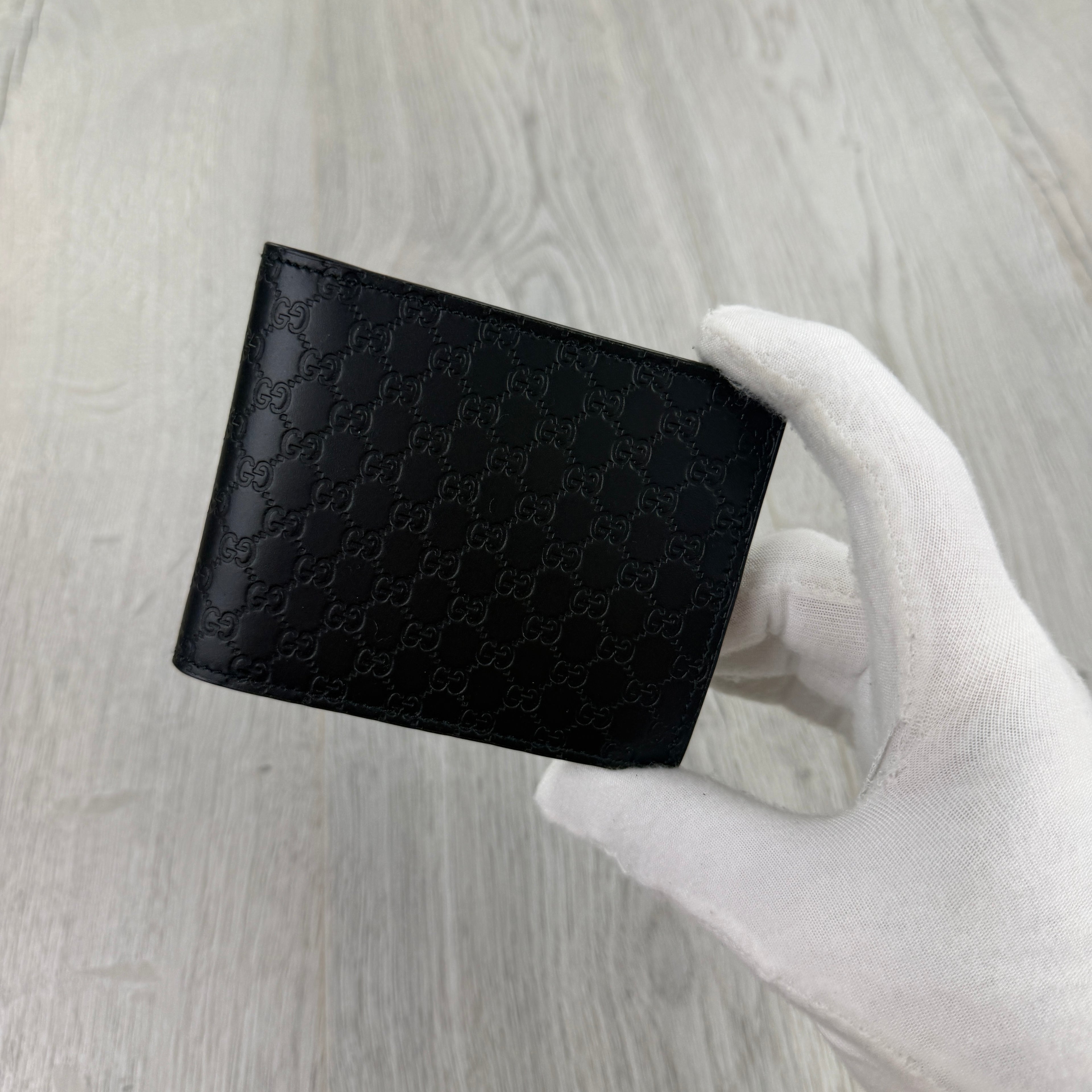 Gucci Men’s GG Leather Monogram Wallet