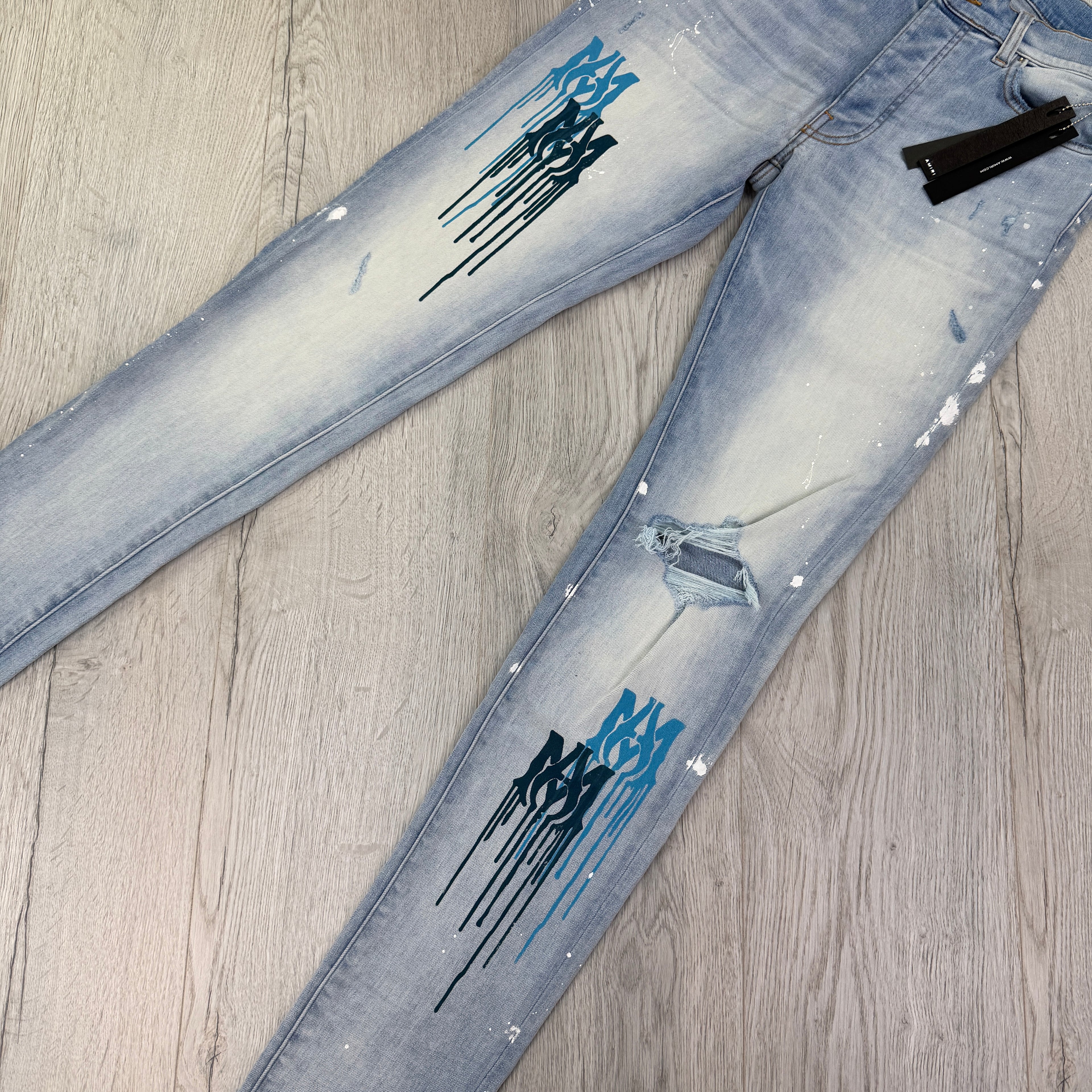 Amiri Men’s MX1 MA Logo Drip Blue Distressed Jeans