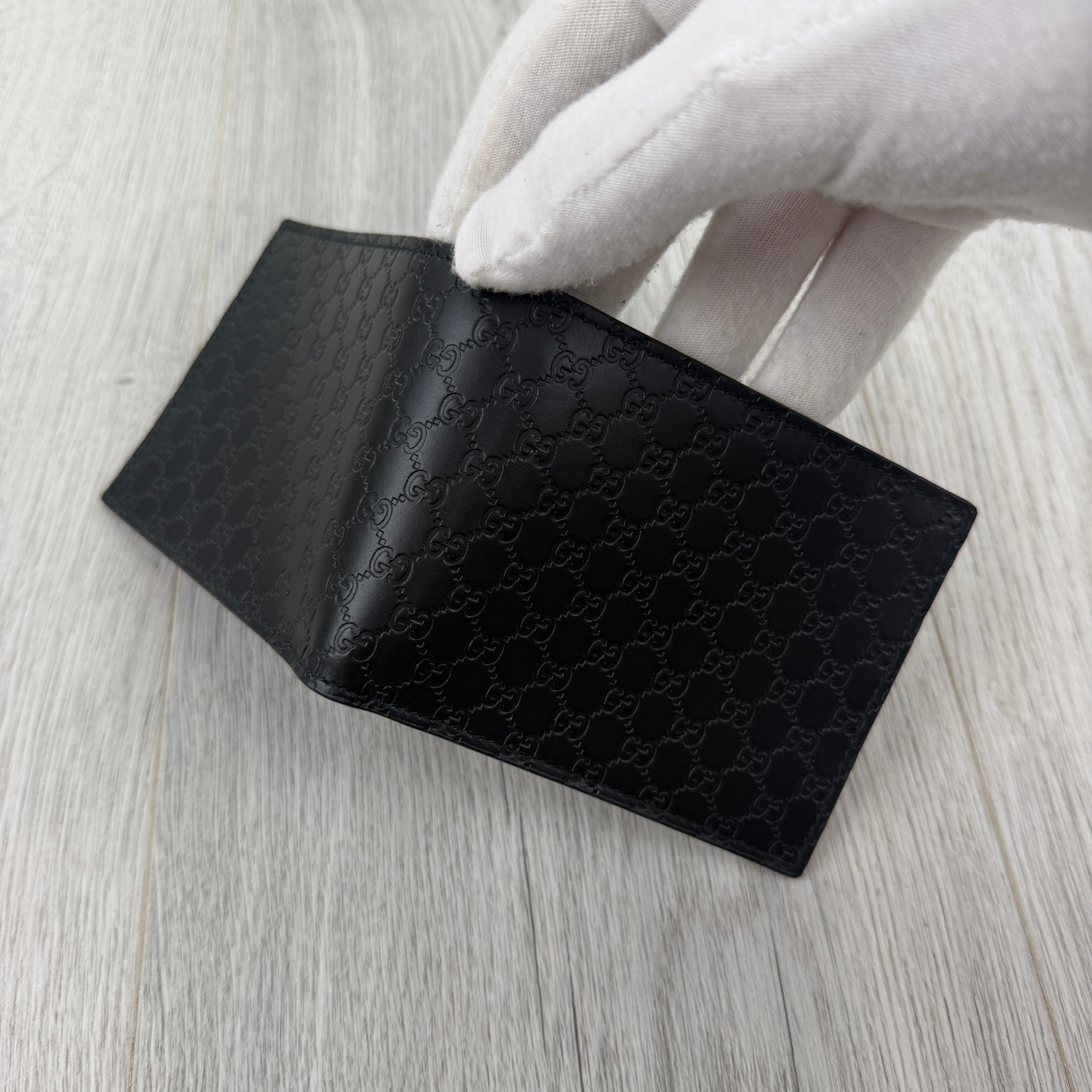 Gucci Men’s GG Leather Monogram Wallet