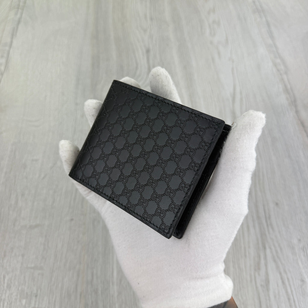 Gucci Men’s GG Leather Monogram Wallet