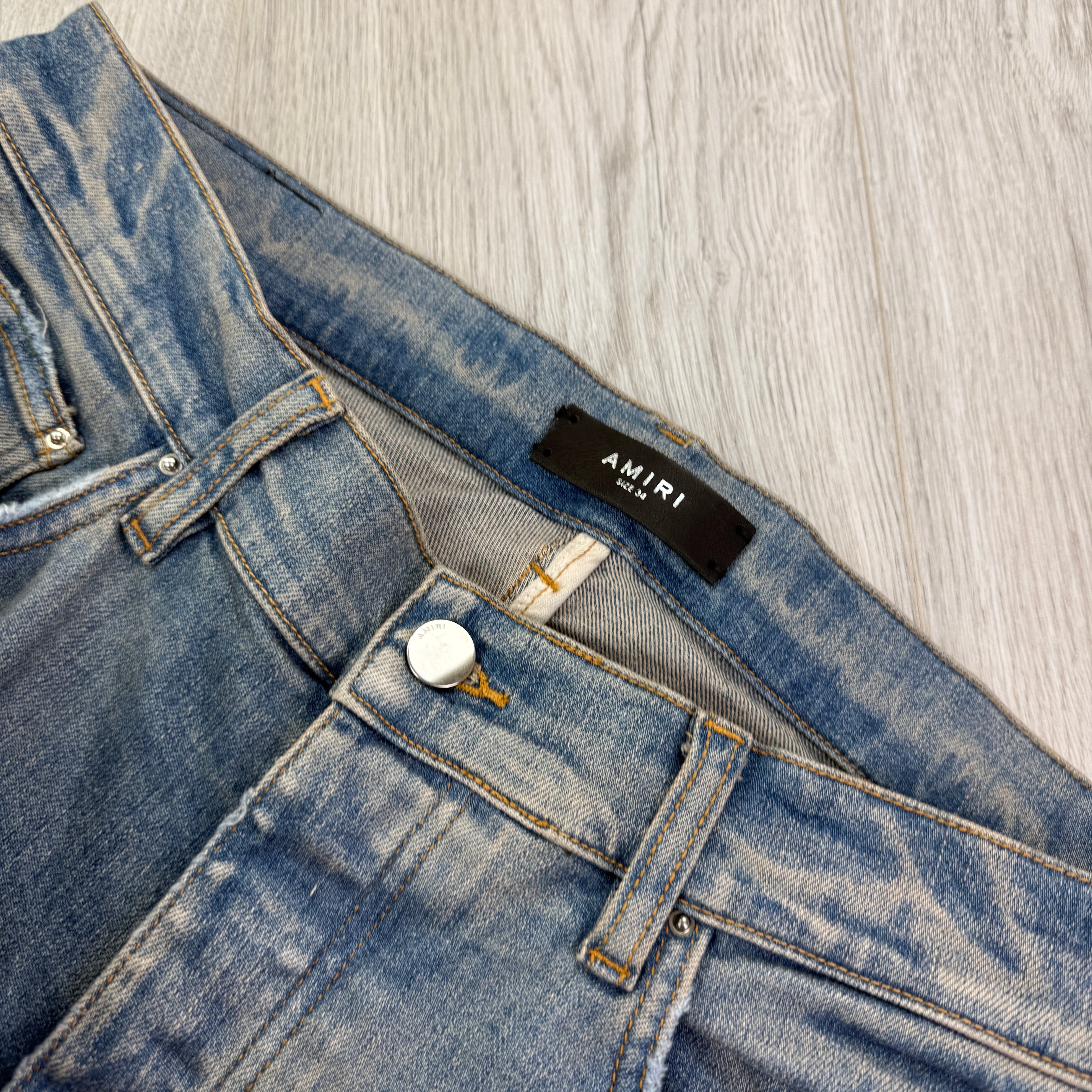 Amiri Men’s MX1 Distressed Camo Applique Logo Jeans