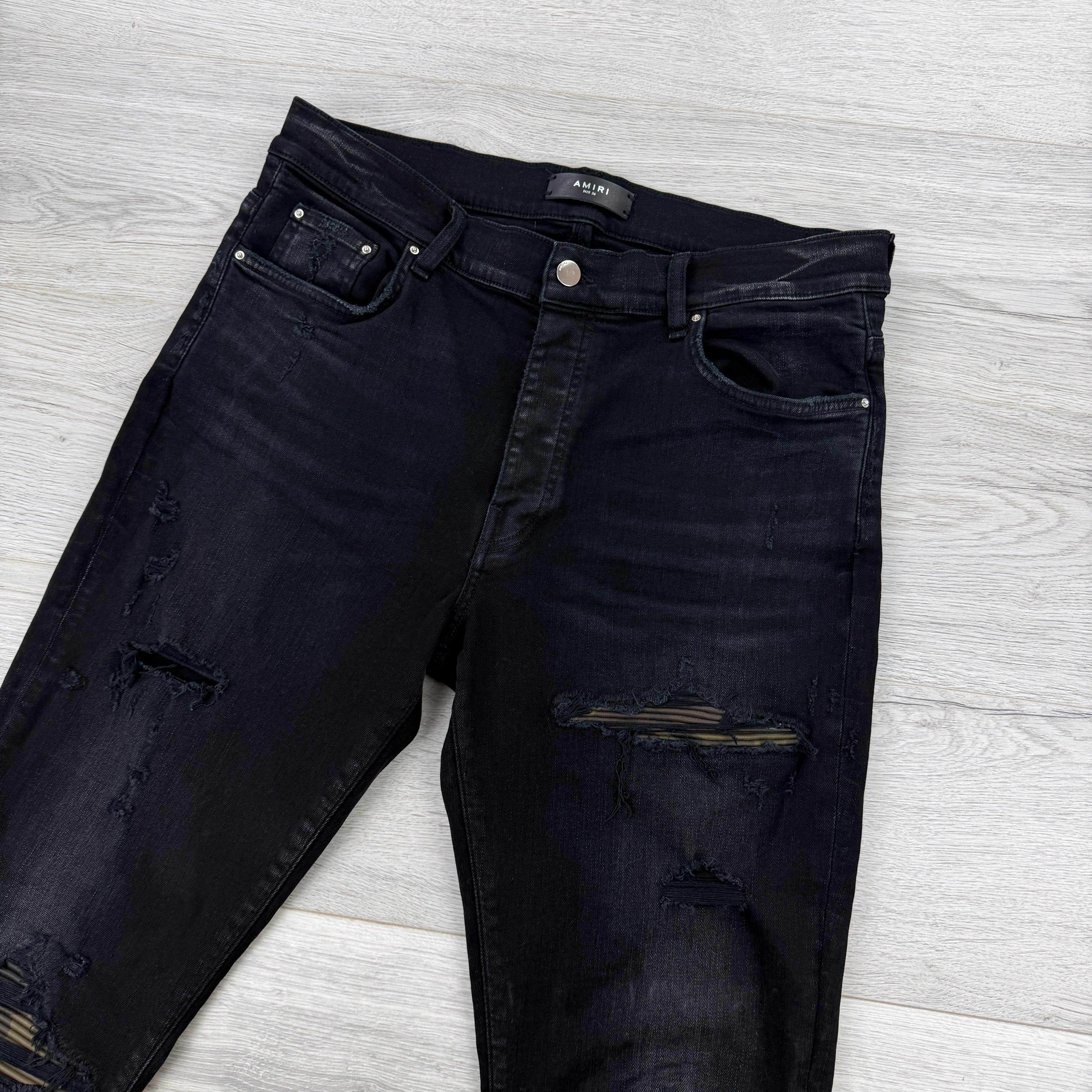 Amiri MX1 Men's Black Distressed Core Camouflage Applique Jeans
