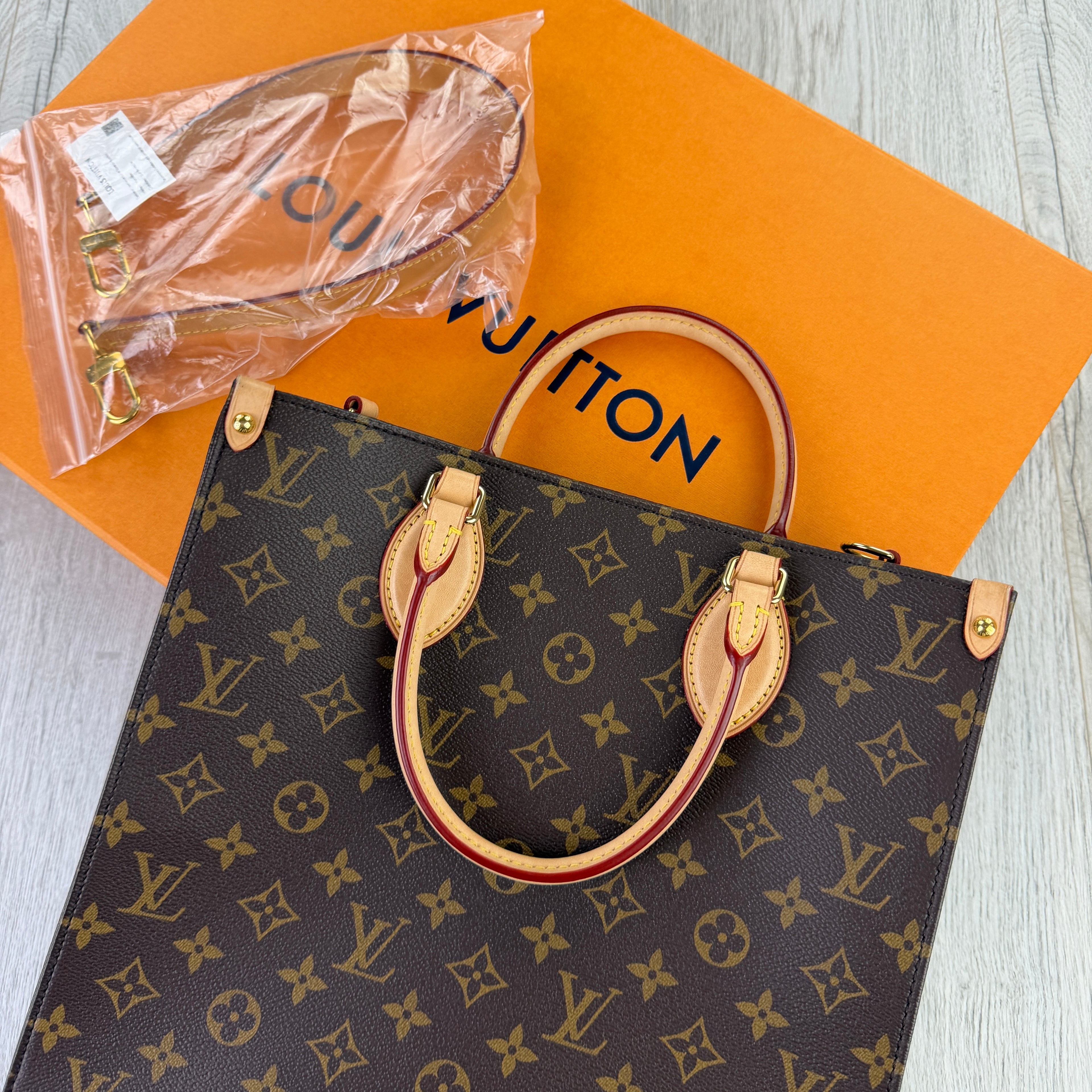 Louis Vuitton Women’s Brown Monogram Cloth Tote Bag