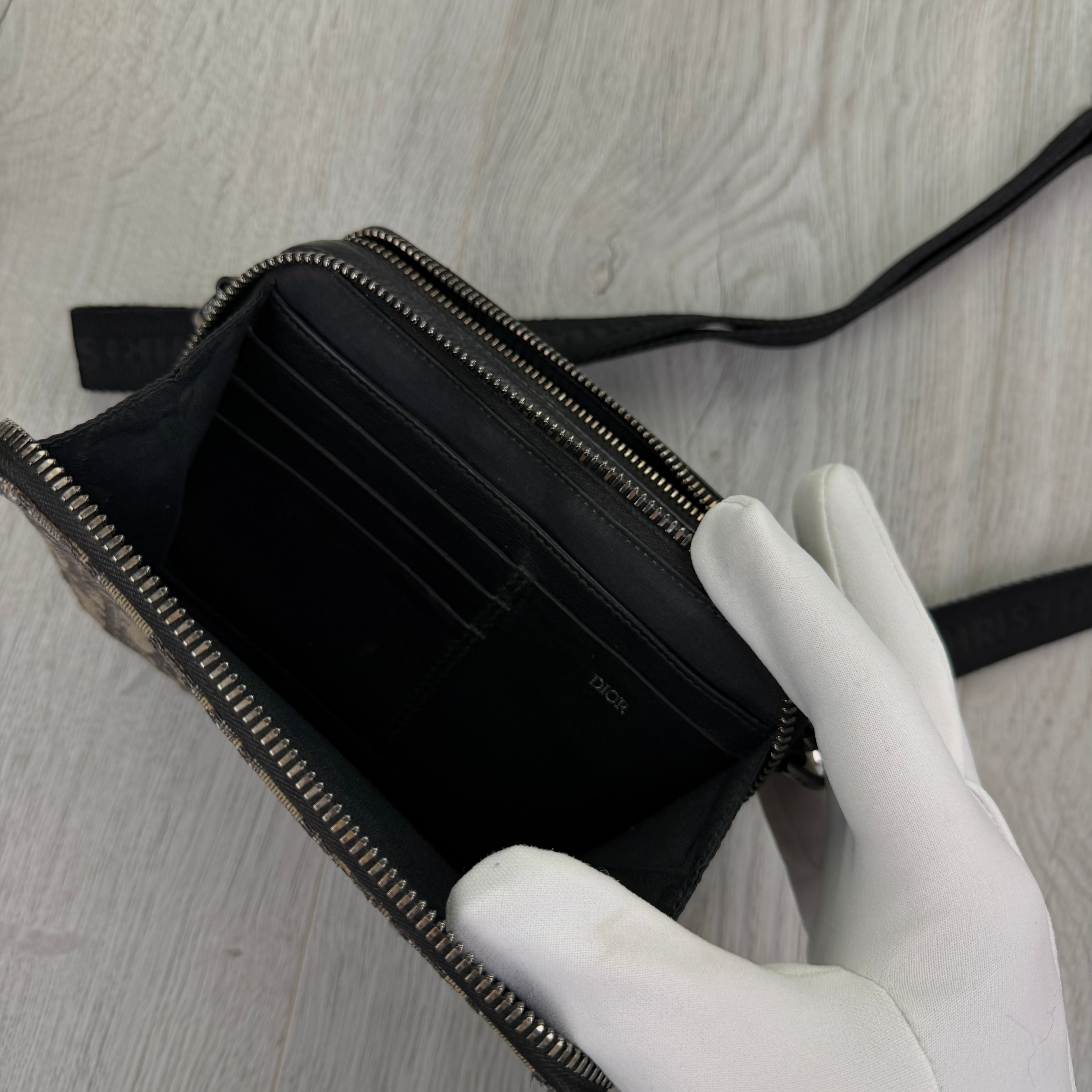 Dior Zipped Pouch With Shoulder Strap Bag