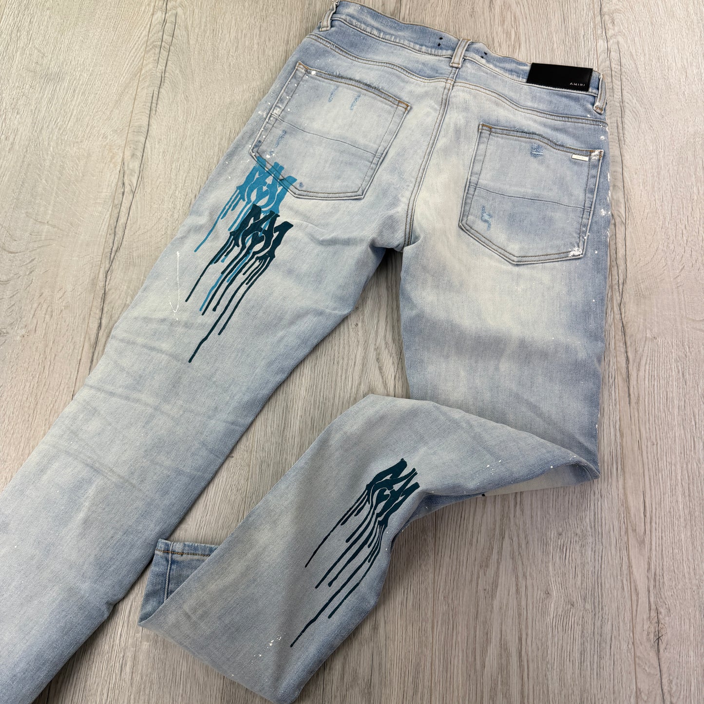 Amiri Men’s MX1 MA Logo Drip Blue Distressed Jeans