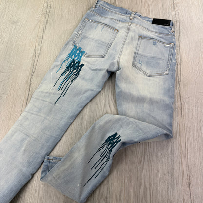 Amiri Men’s MX1 MA Logo Drip Blue Distressed Jeans