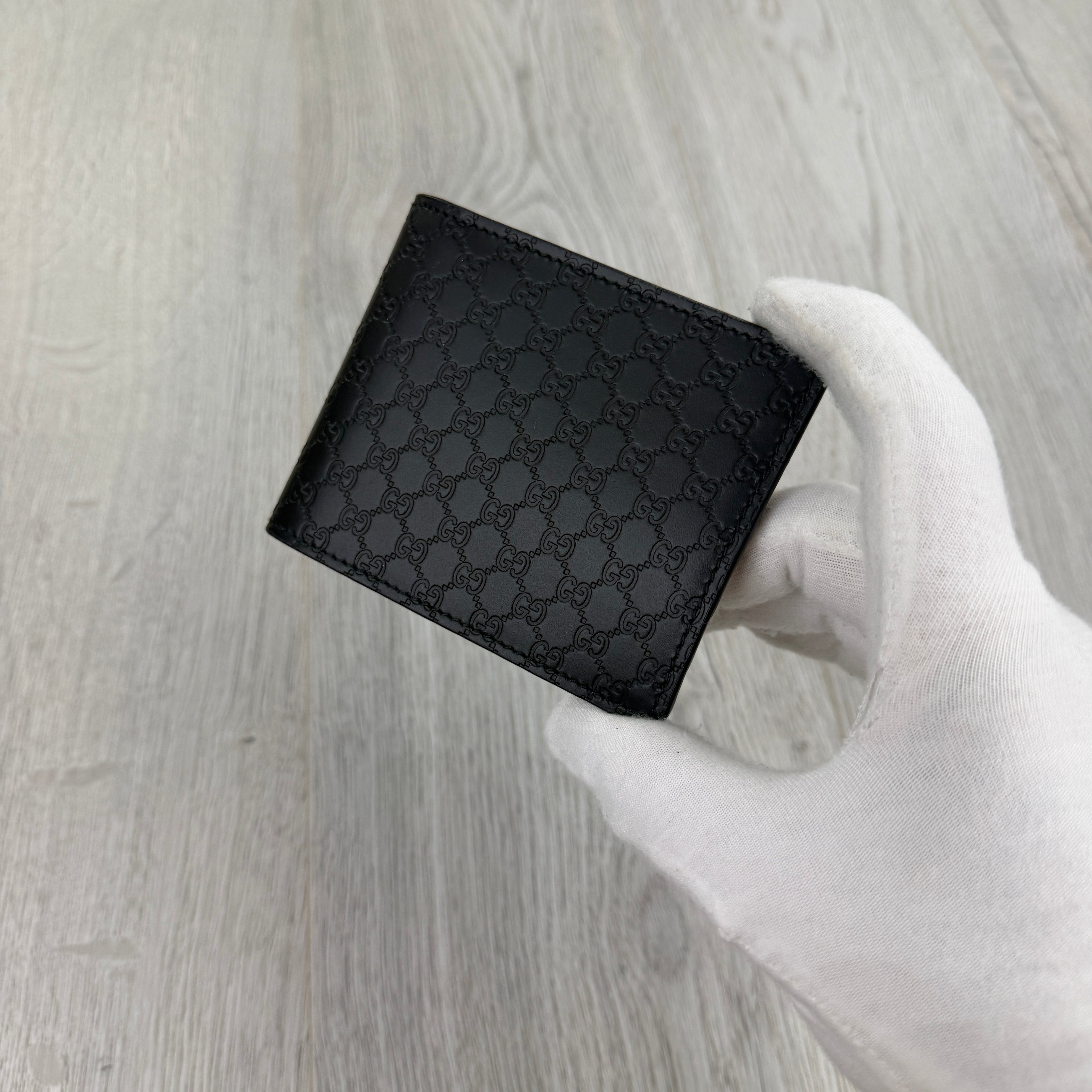 Gucci Men’s GG Leather Monogram Wallet