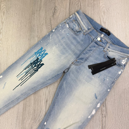 Amiri Men’s MX1 MA Logo Drip Blue Distressed Jeans