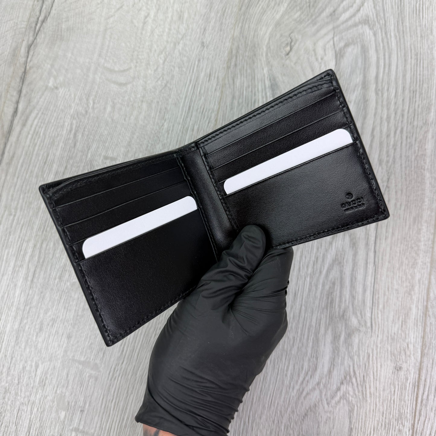 Gucci Men’s GG Leather Monogram Wallet