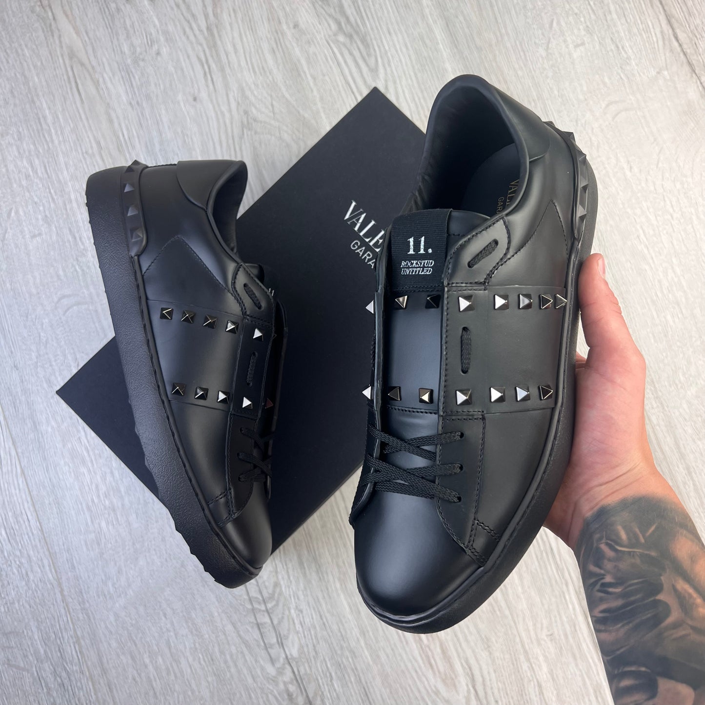 Valentino rockstud sales black sneakers