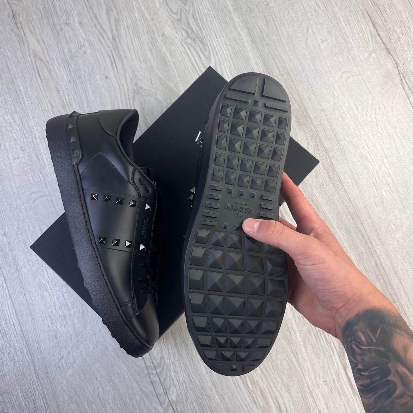 Black valentino rockstud trainers mens hotsell